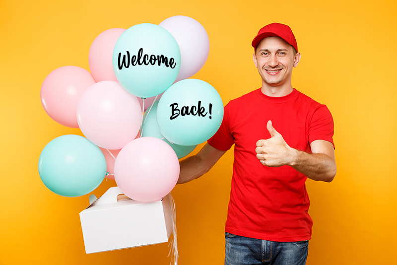 Man Giving Food Order Cake Box Isolated On Yellow Background. Ma