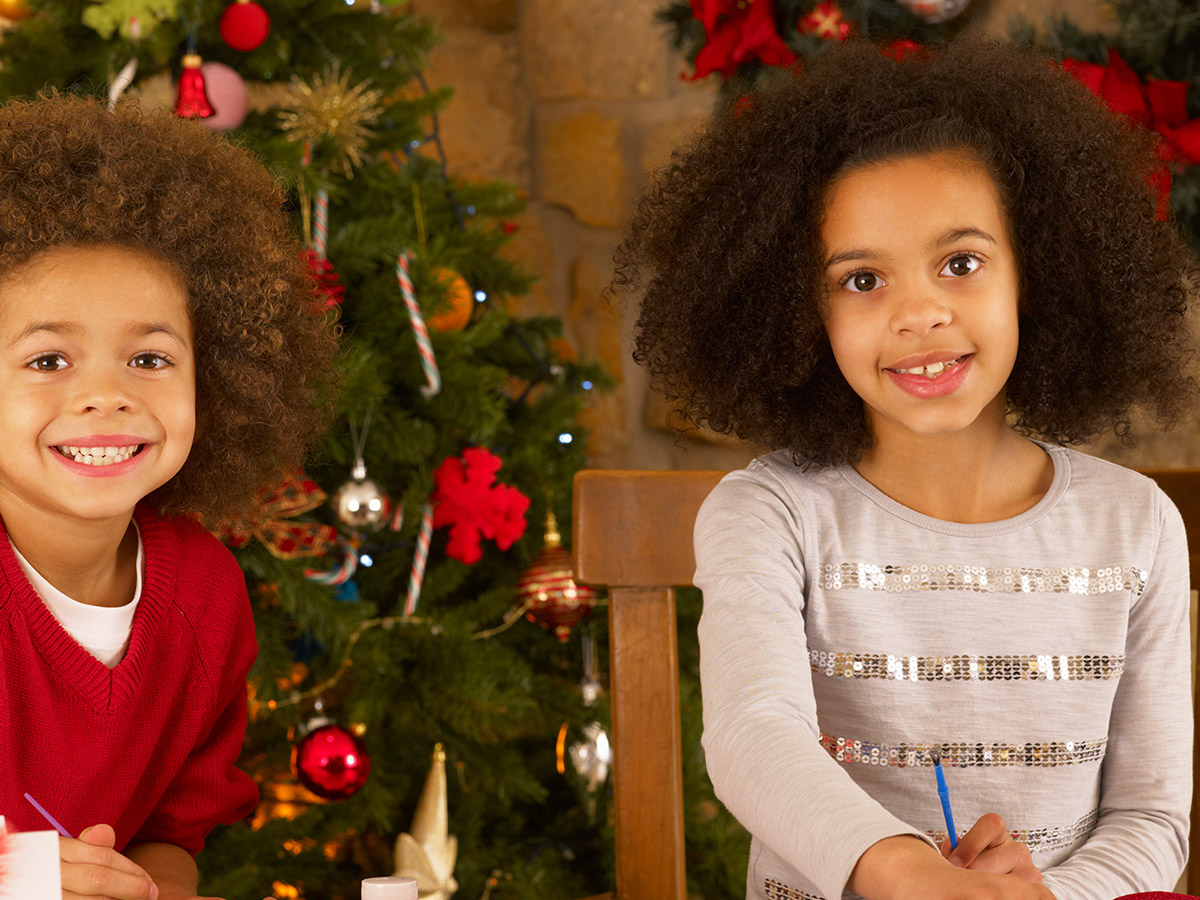 kids making holiday card inserts