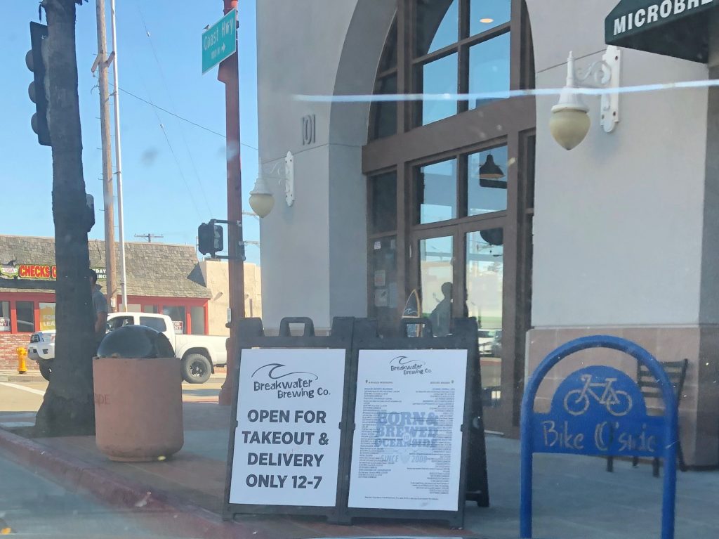 Breakwater Brewing co and restaurant sidewalk sign