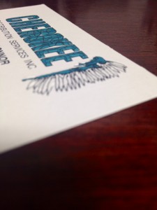 Embossed with ink registration