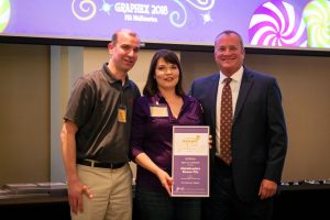 AGKC owners, Haley & Matt Haar, accepting their awards at the PIA Awards Gala. 