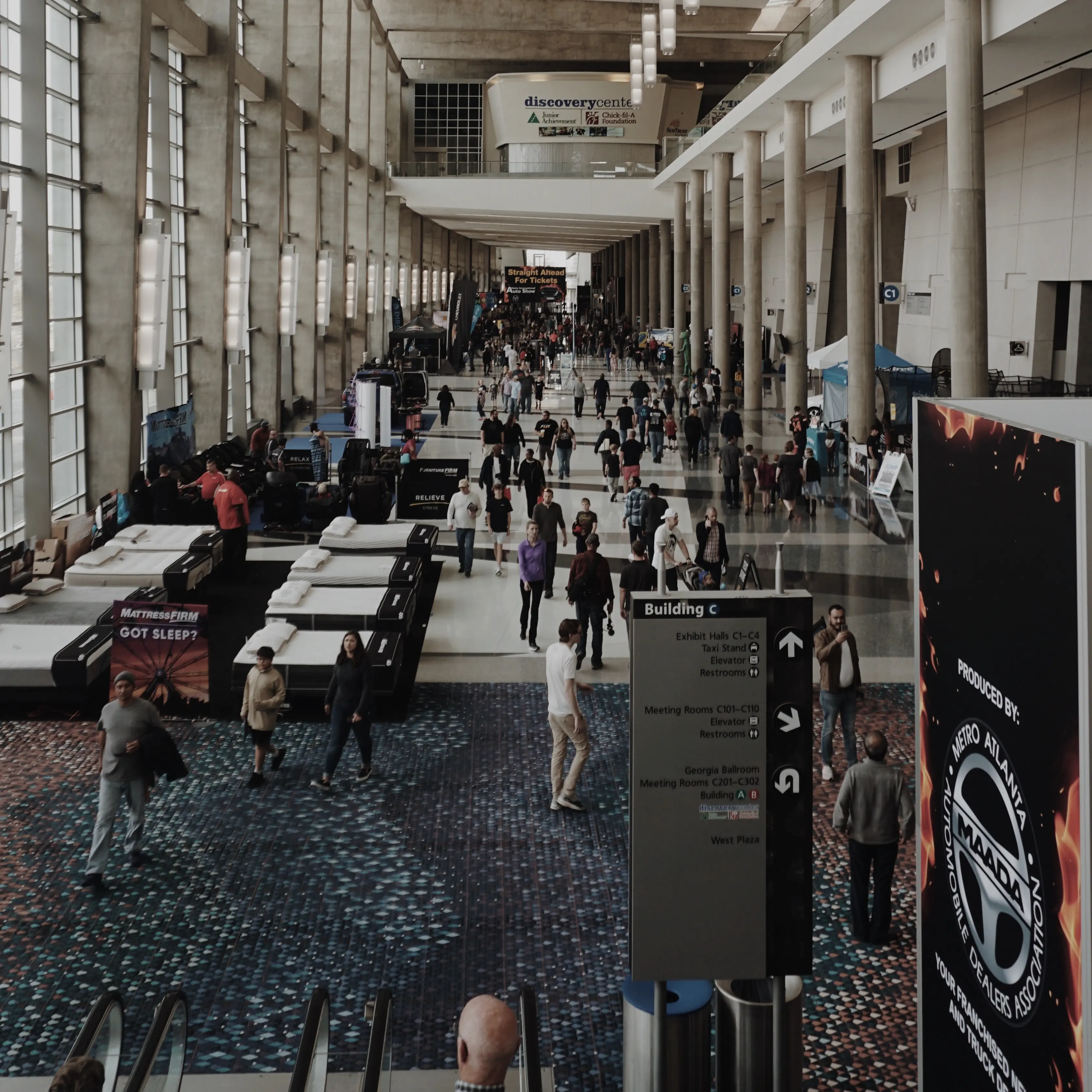 An image of a crowd attending a trade show.