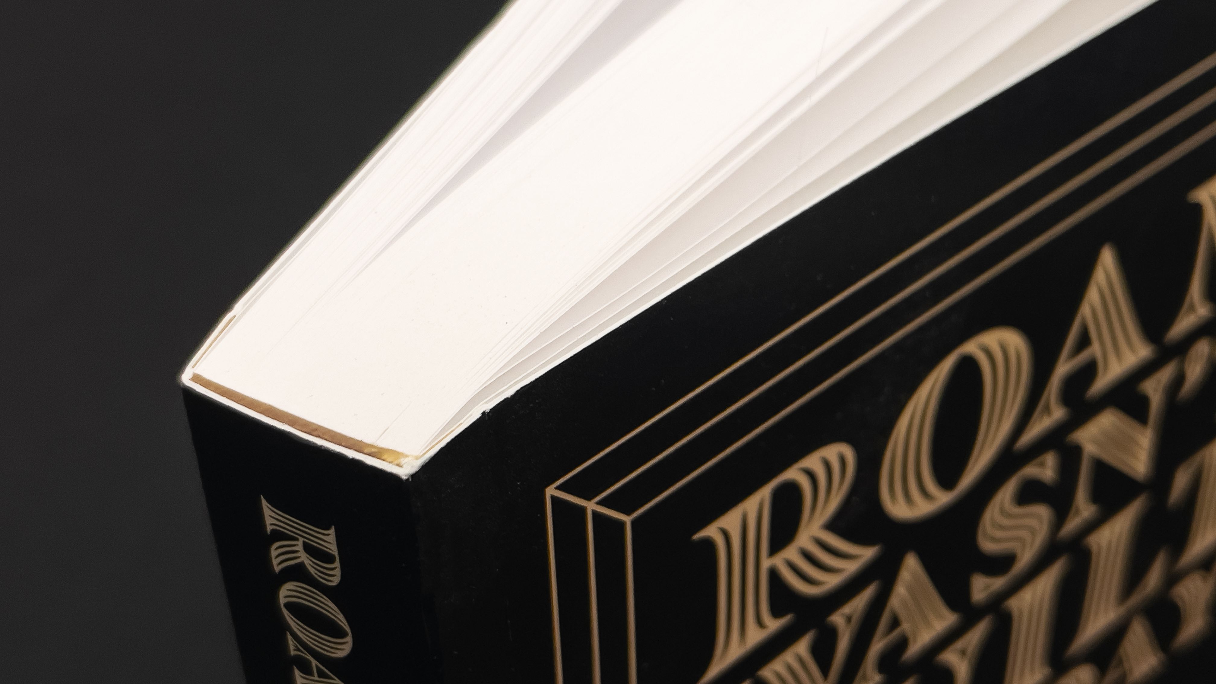 A photo of a softcover book with a perfect binding option.