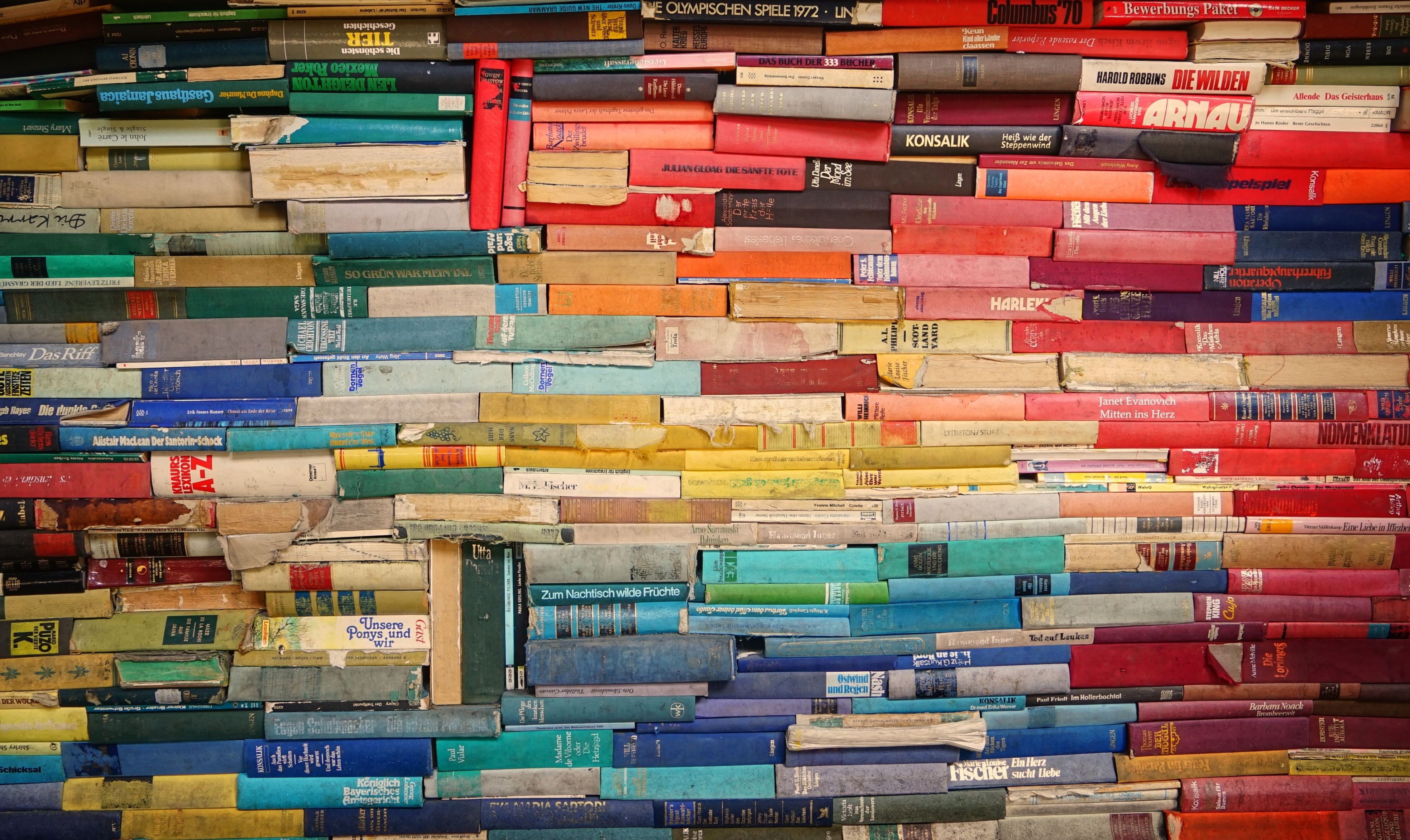 A photo of various books with different binding styles.