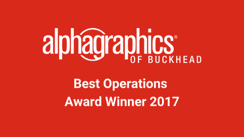 An image showing AlphaGraphics of Buckhead winning Best Operations Award in 2017