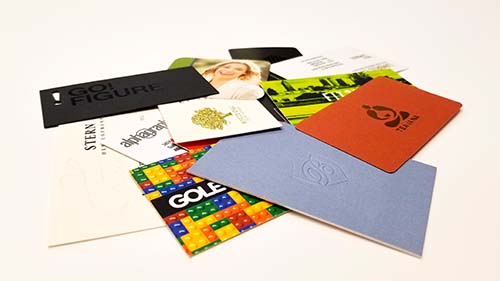 Custom business cards that were designed and printed by AlphaGraphics in Atlanta GA