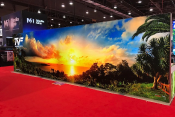 A photo of a trade show backdrop.