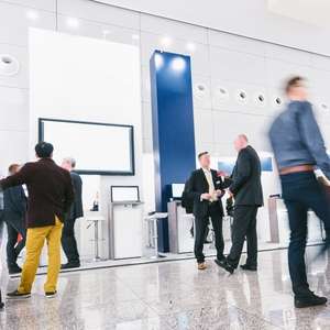 People walking around a trade show