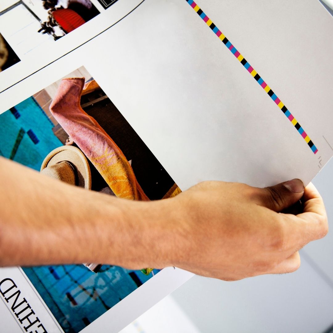 man holding print