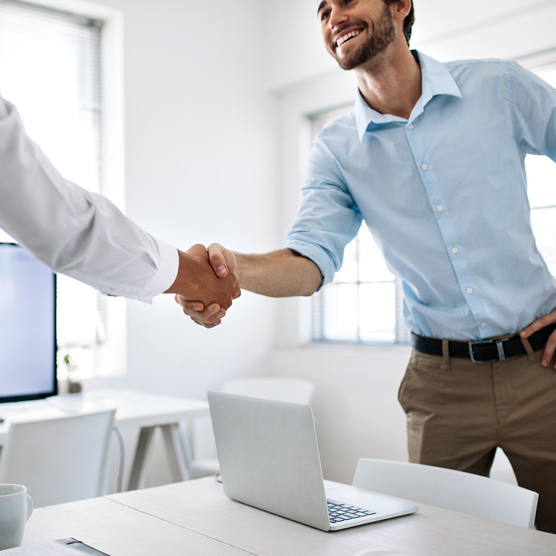 A handshake between partners