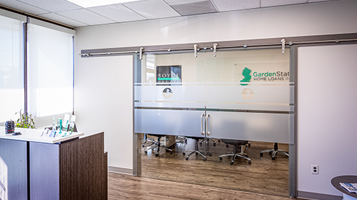 Custom Privacy Frost with Logos on Glass Conference Room Barn Doors