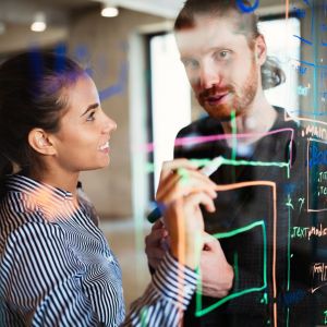 Two small business employees going over their brand capabilities 