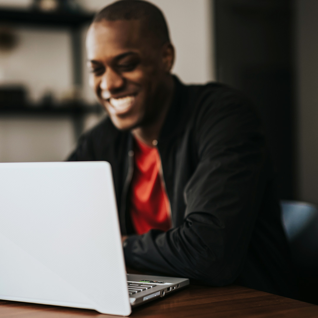 man looking at computer