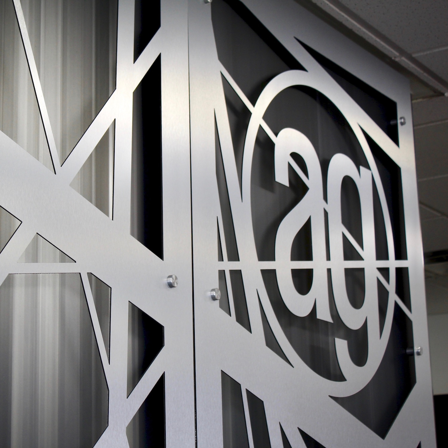 Metal AlphaGraphics Logo