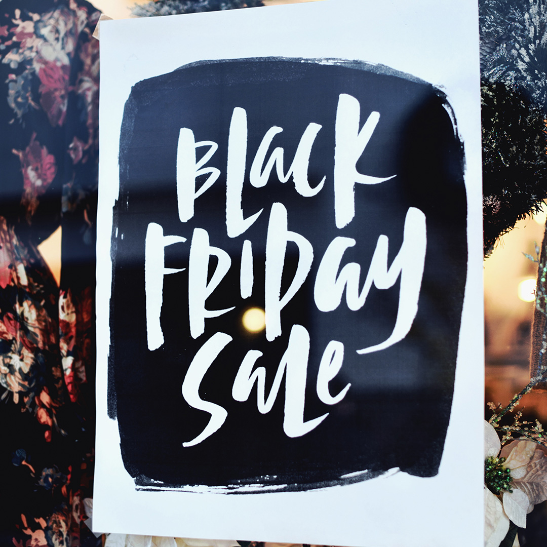 A Black Friday sale sign on a store window