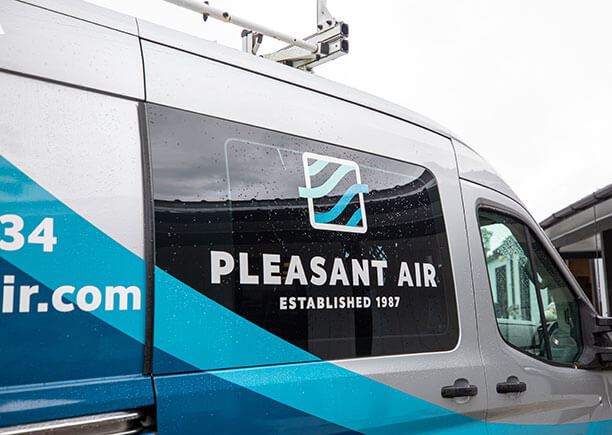 Close up of Pleasant Air's logo on a van