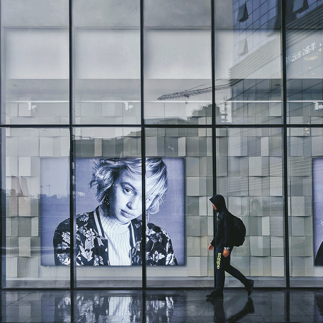 Large images displayed inside a business storefront