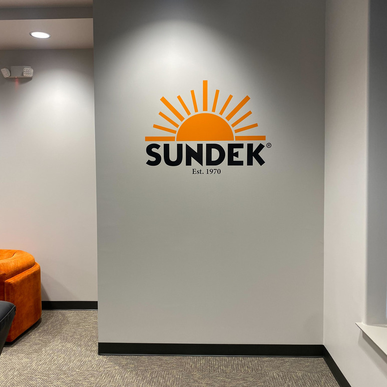 sundek sign