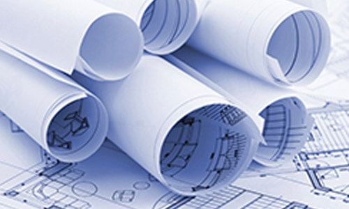 Mound of blueprints rolled up and stacked on one another