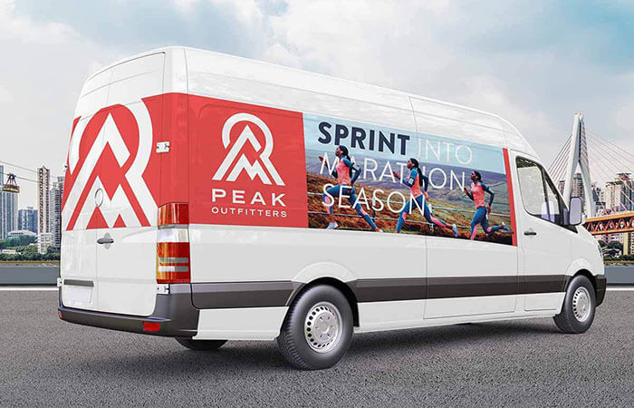 White van with a vehicle wrap