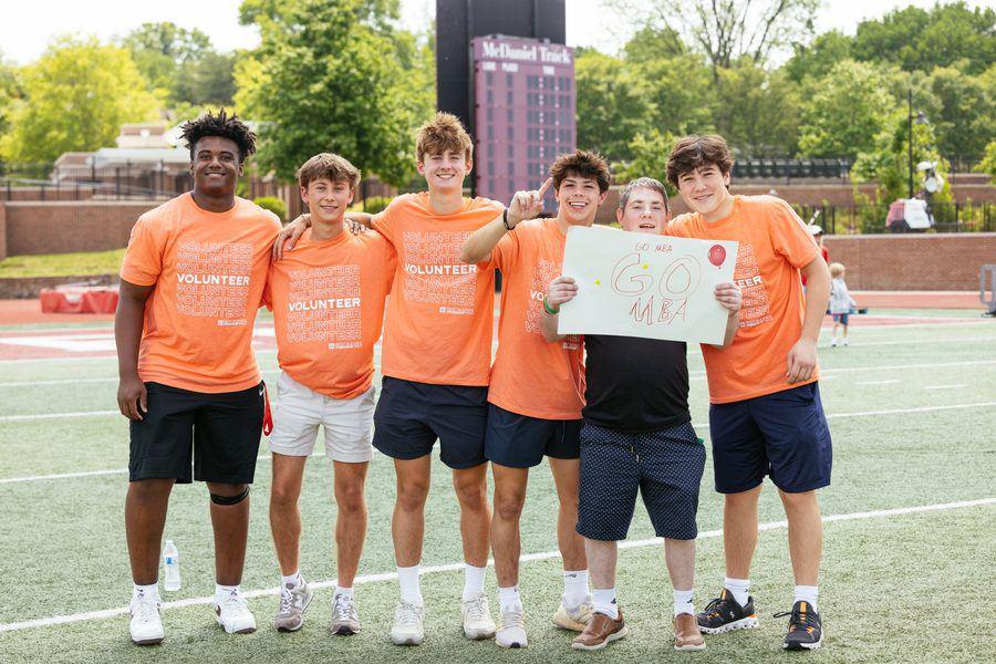 Volunteers wearing custom branded apparel shirts