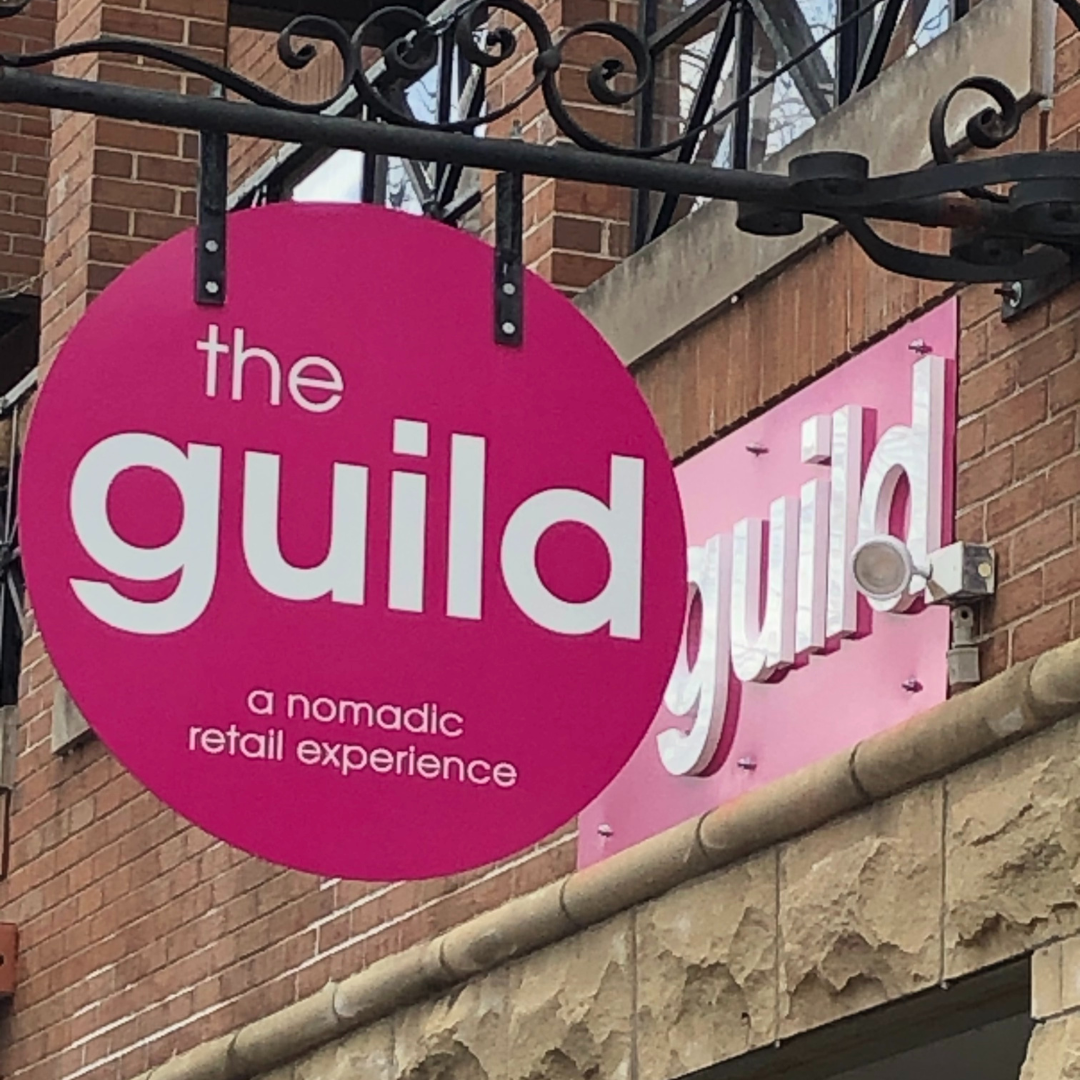 large pink sign