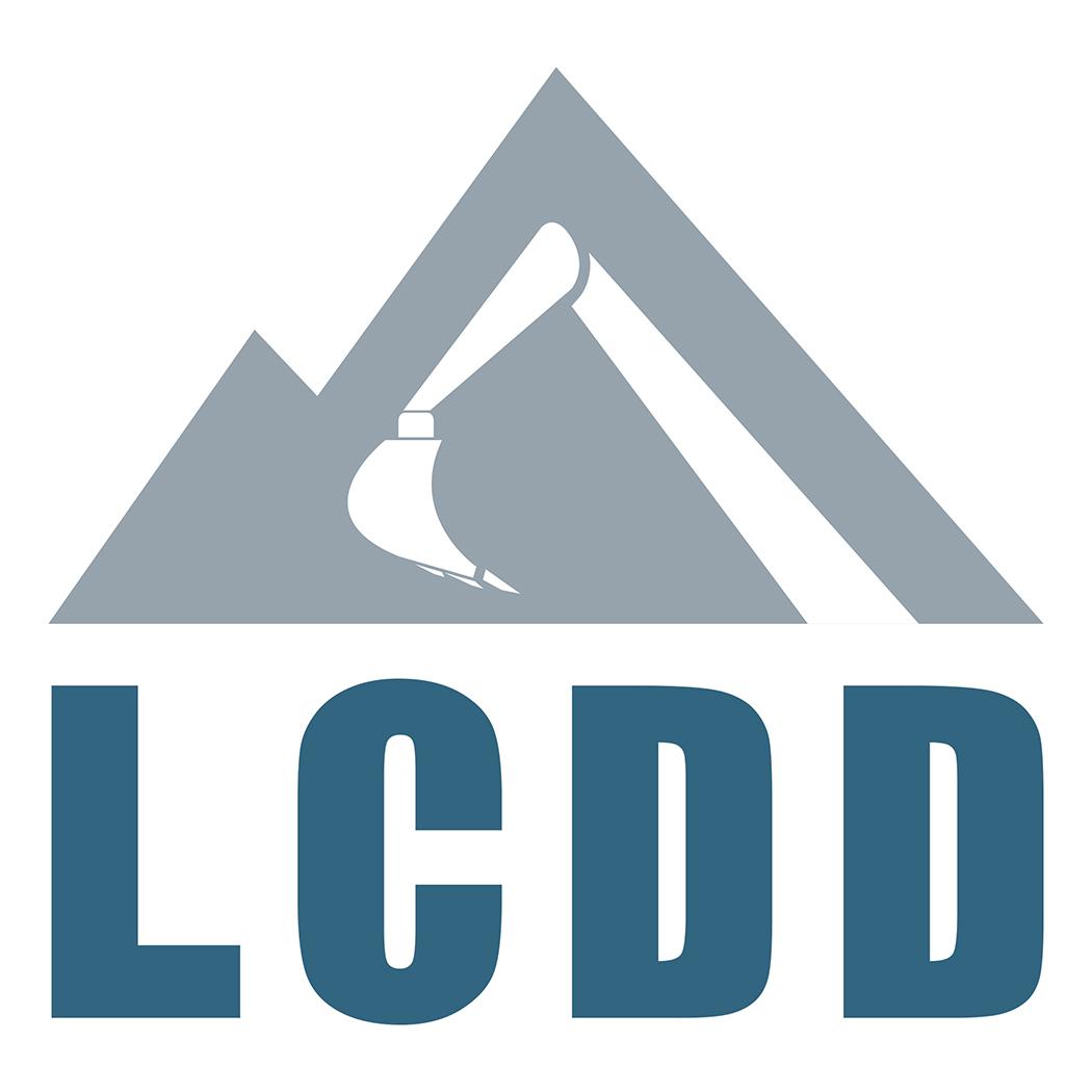LCDD logo with an excavator bucket against a gray mountain over blue lettering
