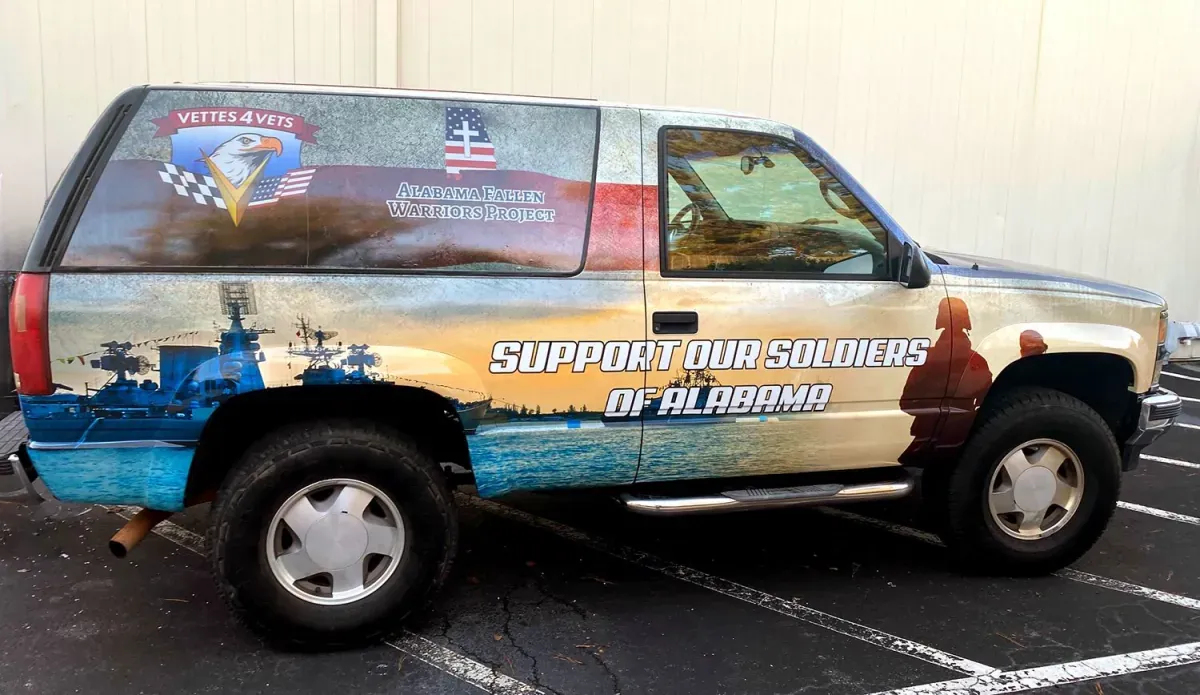 Full wrap on a Chevy Tahoe for Support Our Soldiers of Alabama with Vettes 4 Vets and Alabama Fallen Warriors logos