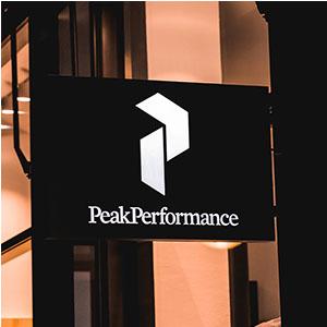 A business sign on an exterior wall