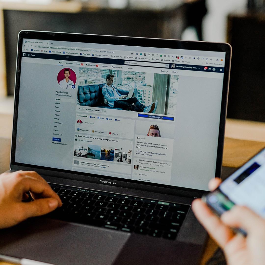 A laptop screen with Facebook on it