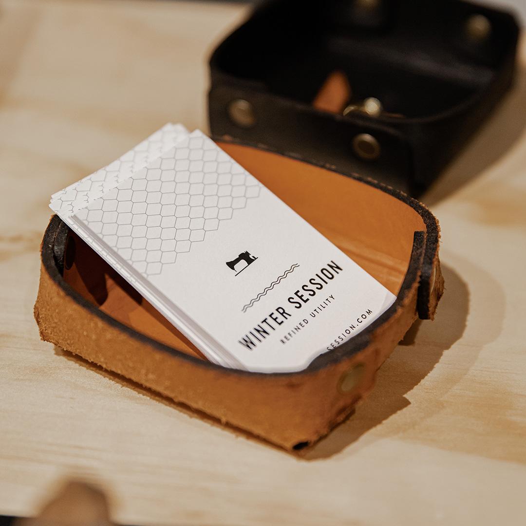 Custom printed business cards in a leather bowl