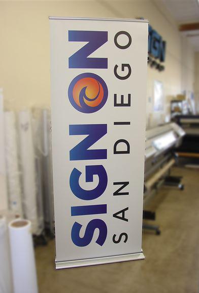Retractable banner stand