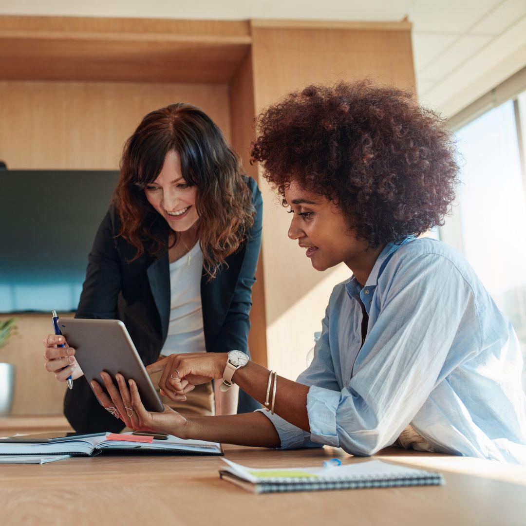 women looking at tablet