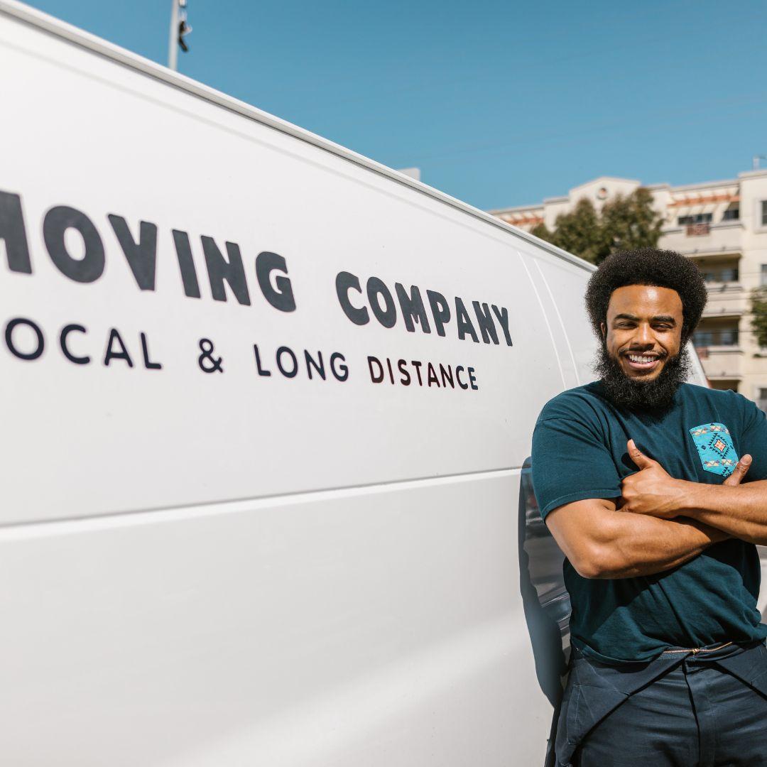 Man standing by moving van
