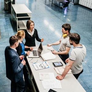 Print professionals working together on a project