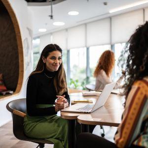 A woman interviewing someone