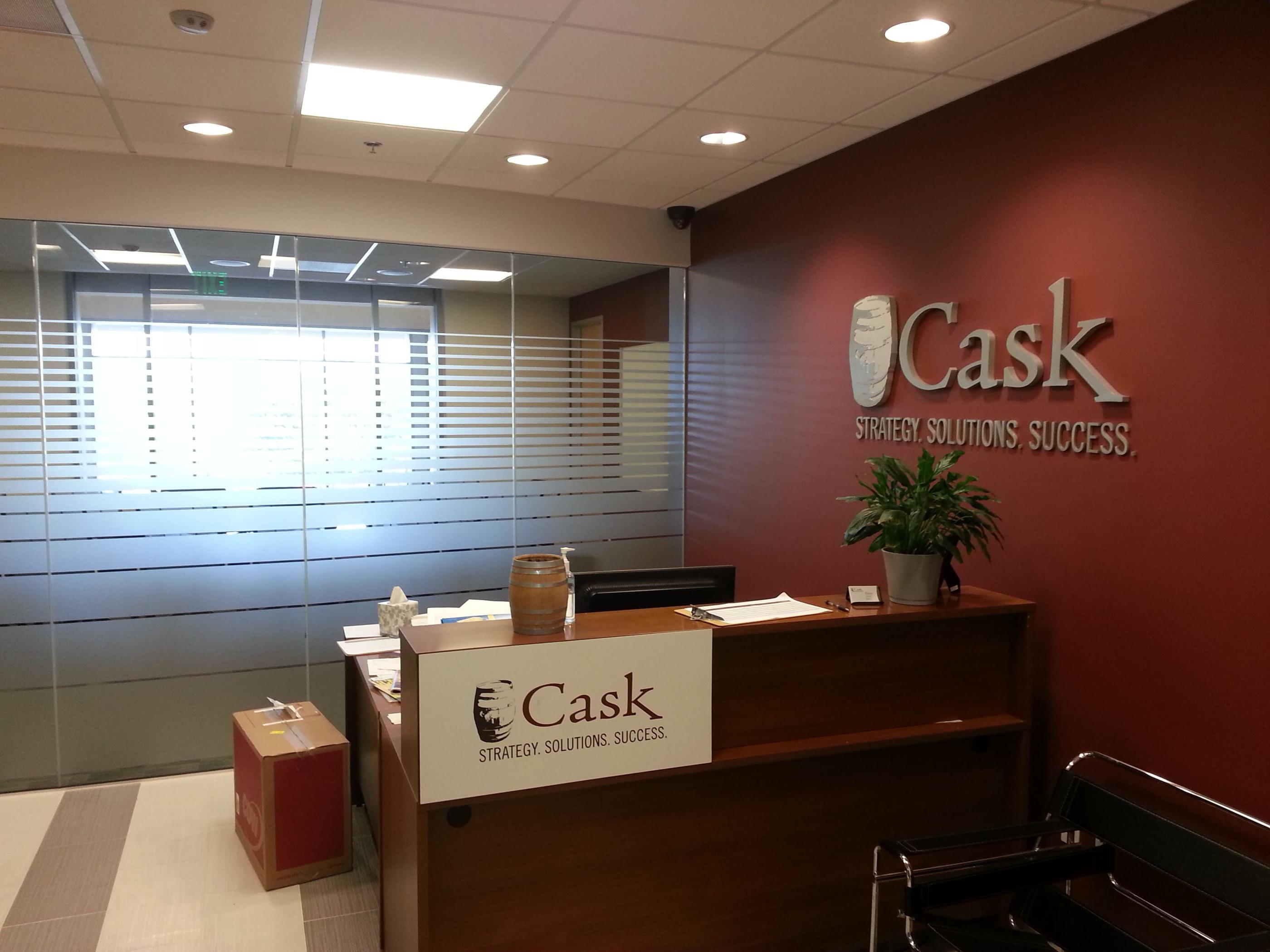 Cast metal aluminum letters / logo and frosted vinyl conference room glass