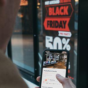 Black friday sale signs on business window