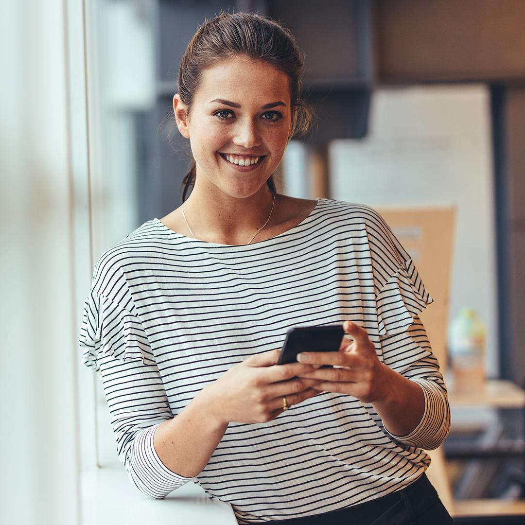 woman holding phone