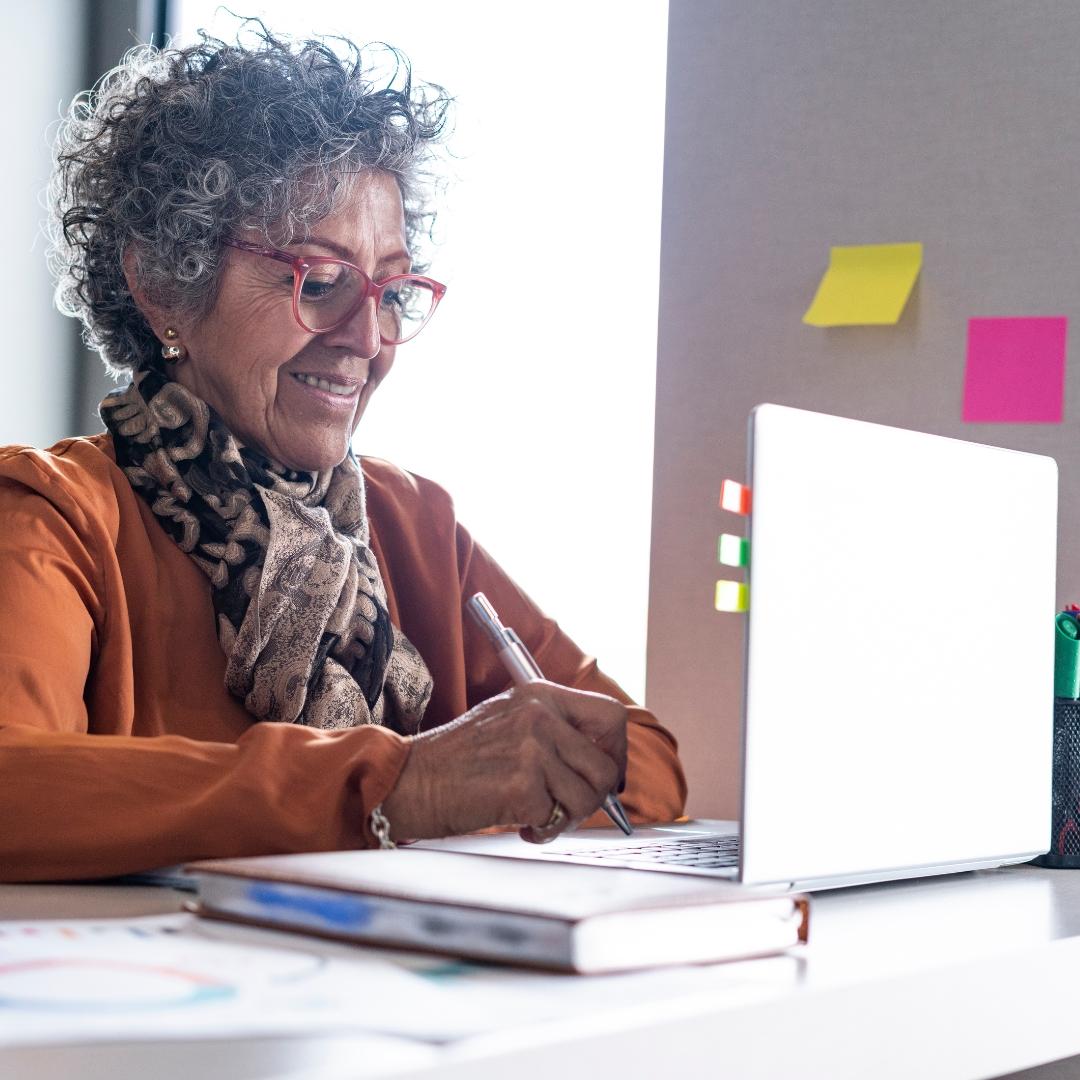 woman at her home desk
