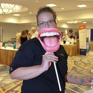 Person holding prop at tradeshow