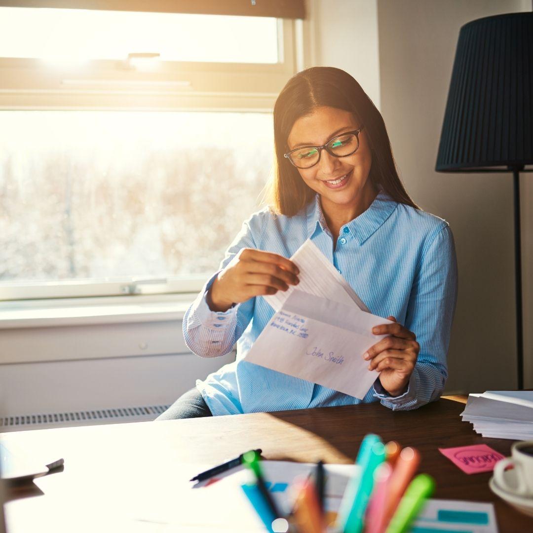woman looking at mail