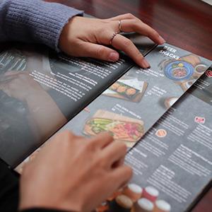 A folded brochure showing food items