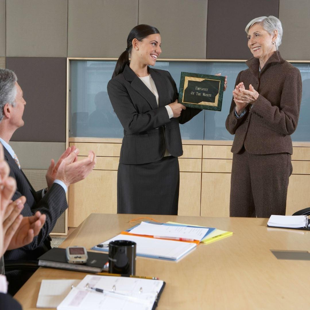 employee being given award