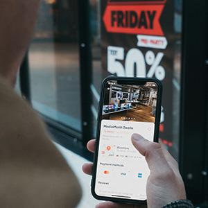 Black Friday sale ad on person's phone