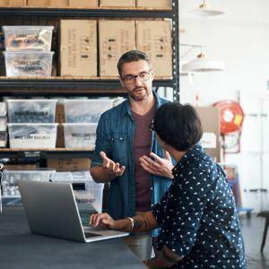 Two business owners speaking about their business branding