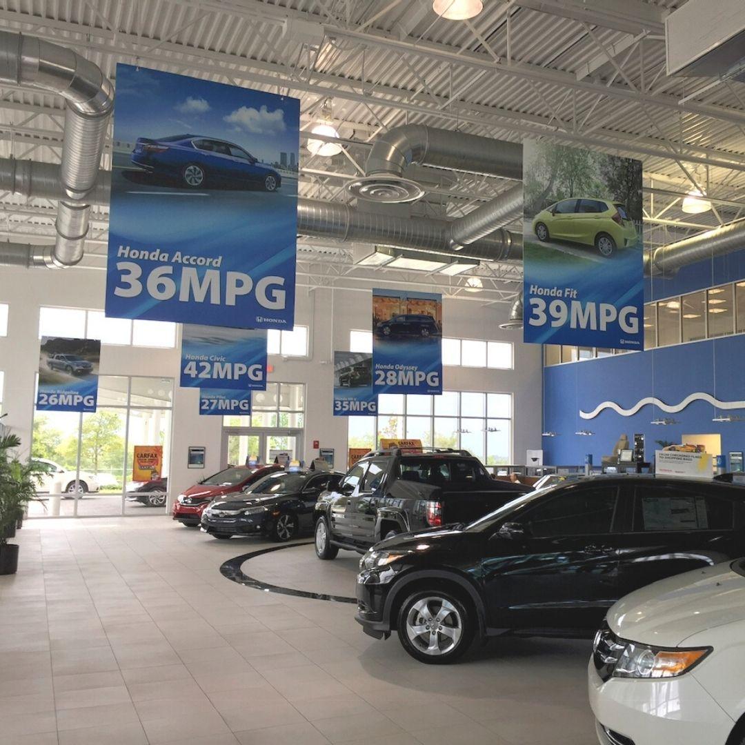 car dealership with banners