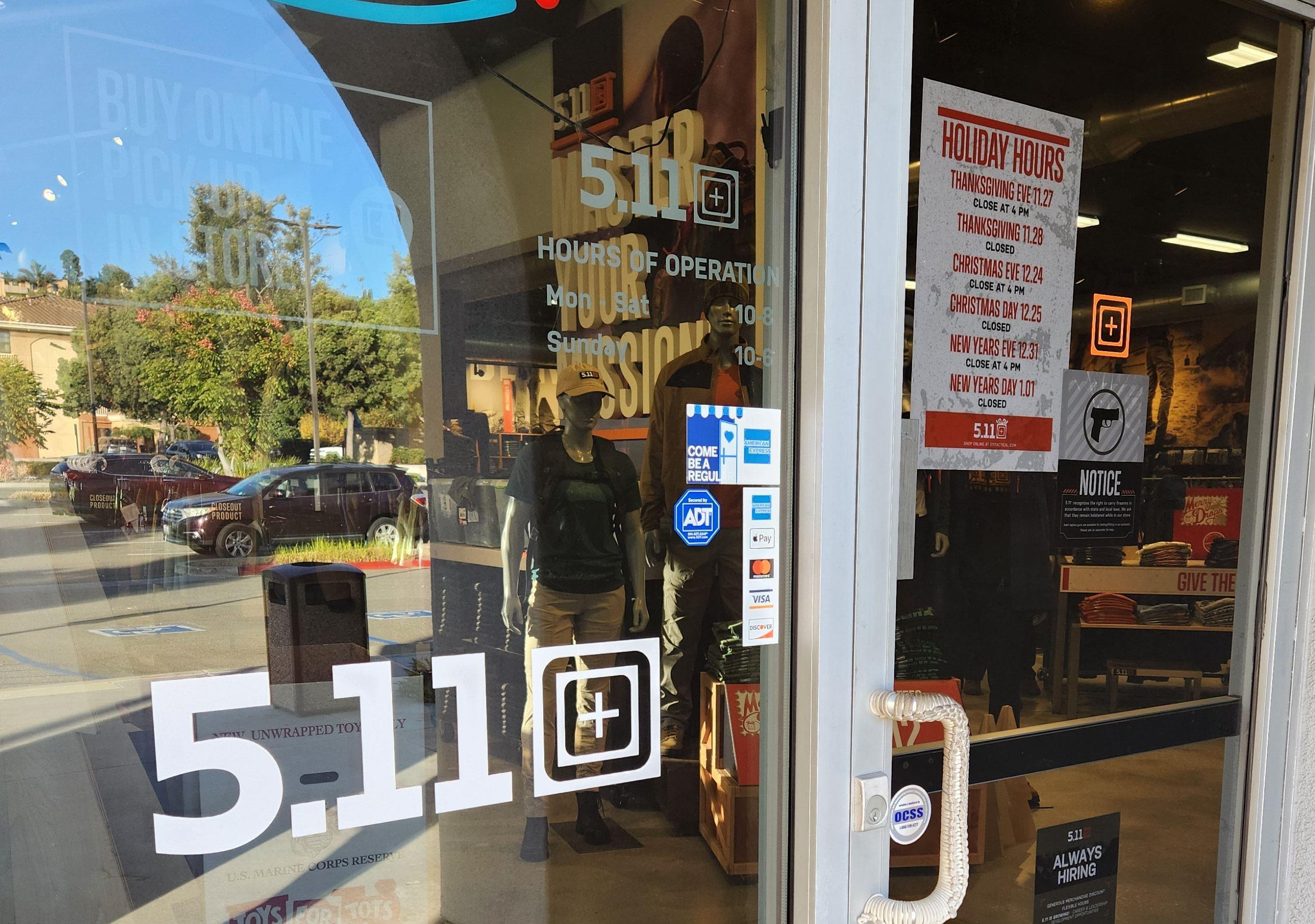 511 white cut vinyl window graphics near front entrance door