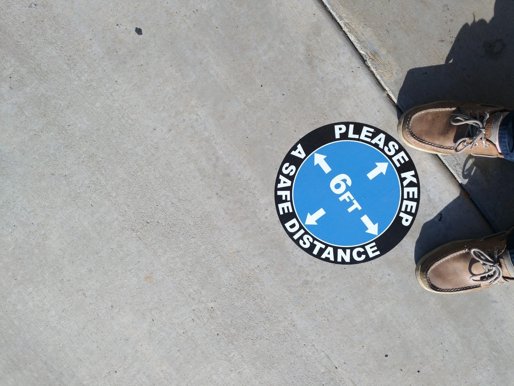 Safe Social Distancing with Customized Floor Decals and Graphics