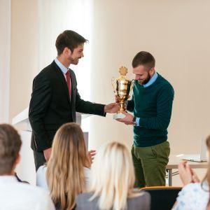 An office worker receiving an award